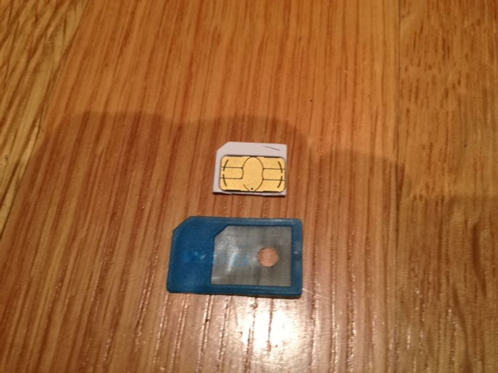 Get a Micro Sim card (like the ones found in the iPhone 4) and a Micro Sim Adapter (easily purchased on eBay for $0.99)