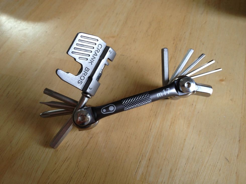 Get a multi-tool. This is the most important piece as you can use it to tweak or fix most parts of the bike. At minimum, make sure you have 4 & 5mm hex tools and phillips & flat head screwdrivers.