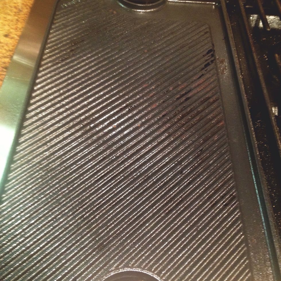 get a pan, grill, or panini press. drizzle with olive oil. set heat to medium-low.