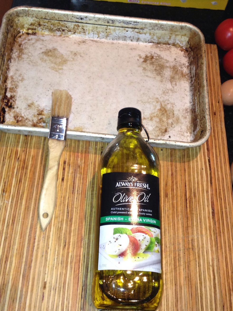 Get a pan oil and a brush