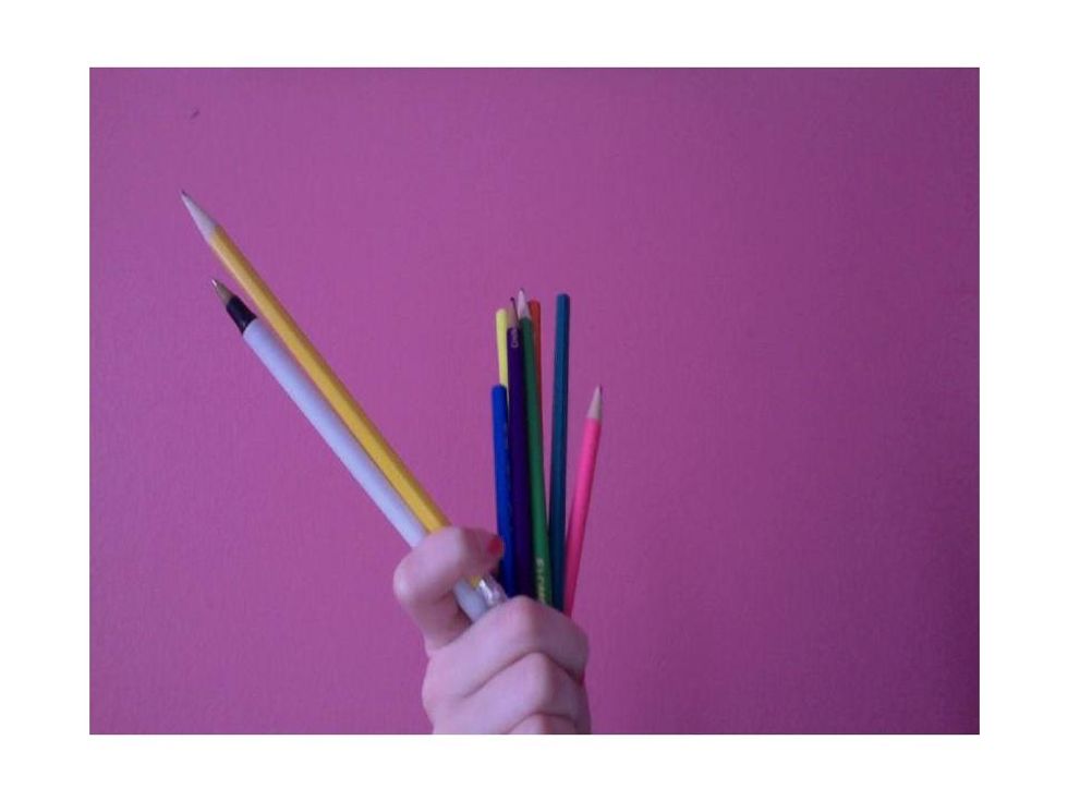 Get a pen and pencil. Also, have a couple colored pencils nearby that you can use. :} Get a sketch pad too