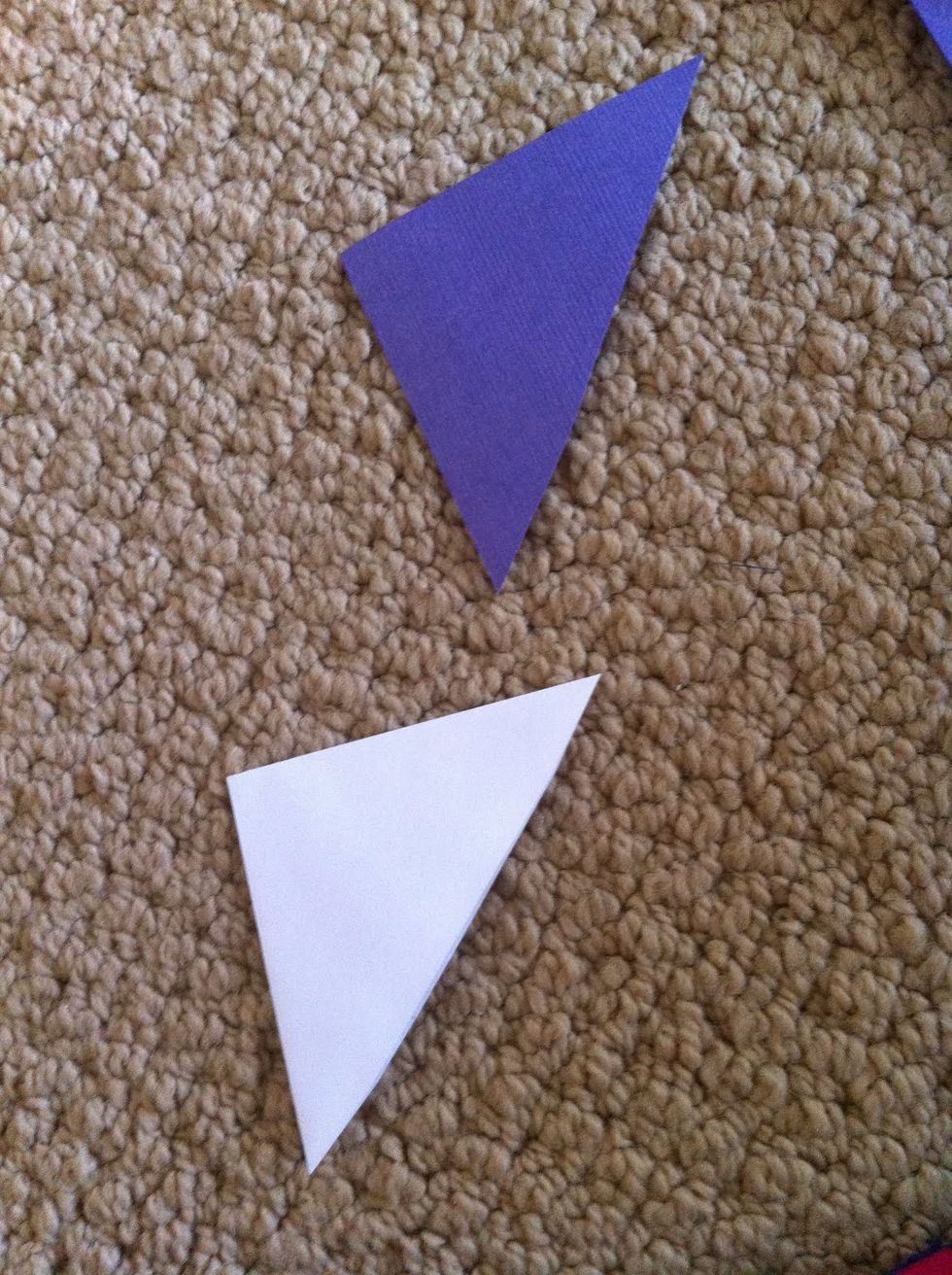 get a piec of paper  and use the scissors and cut it to be triangle and glue it to the boat