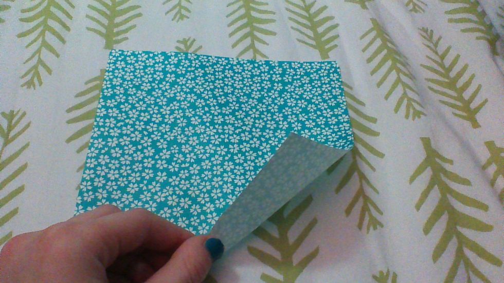 Get a piece of Origami paper, it can be regular paper but it'll be harder to fold. Pick any design you want. Also, this HAS to be square otherwise it won't turn out right\ud83d\ude03\ud83d\ude09