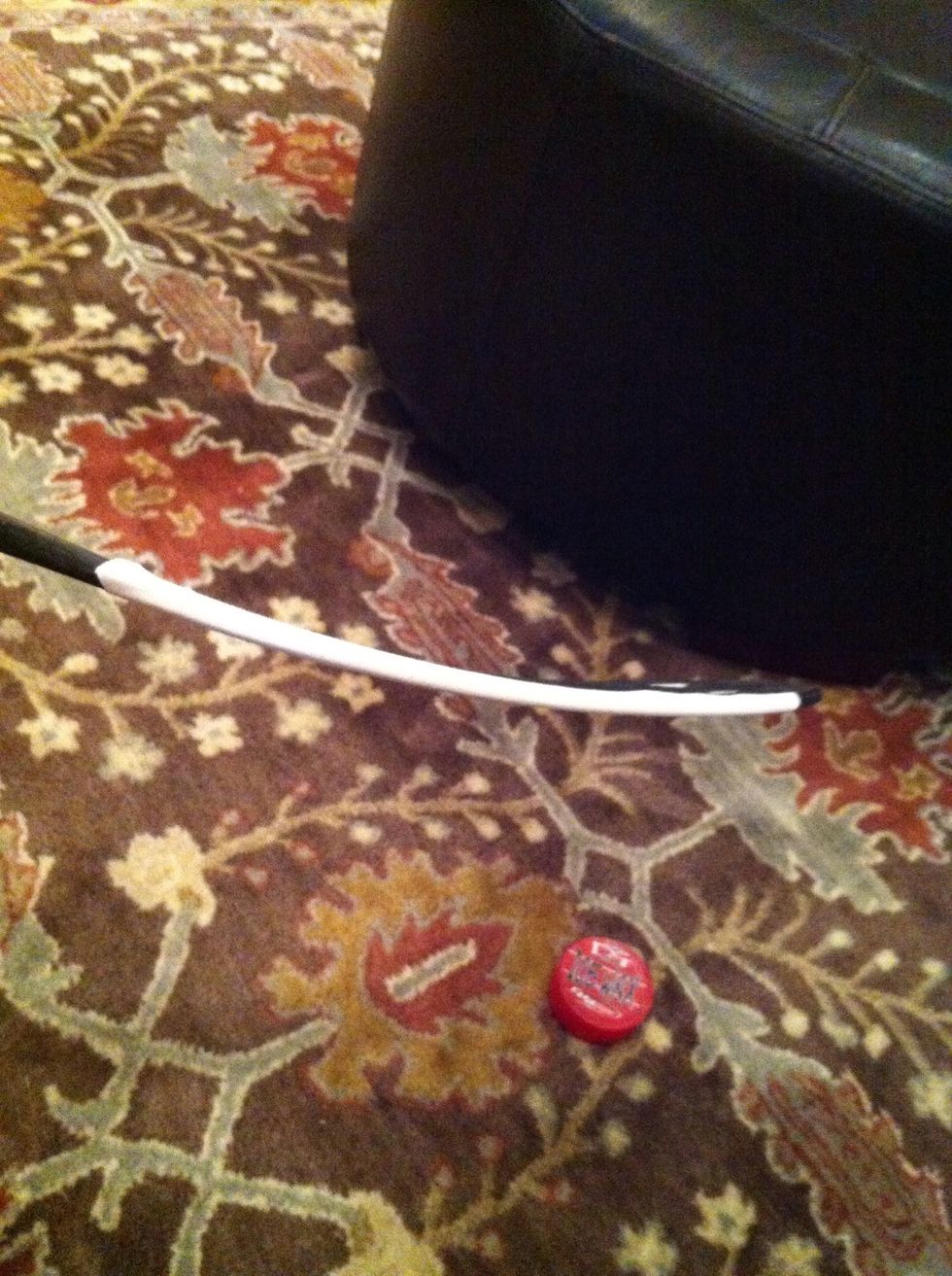 Get a piece of tape and cover the bottom or the blade.