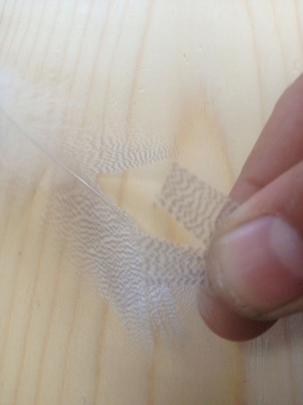 Get a piece of your chosen feather and trim as much as you want for your jig. More feather the fuller but not necessarily better.