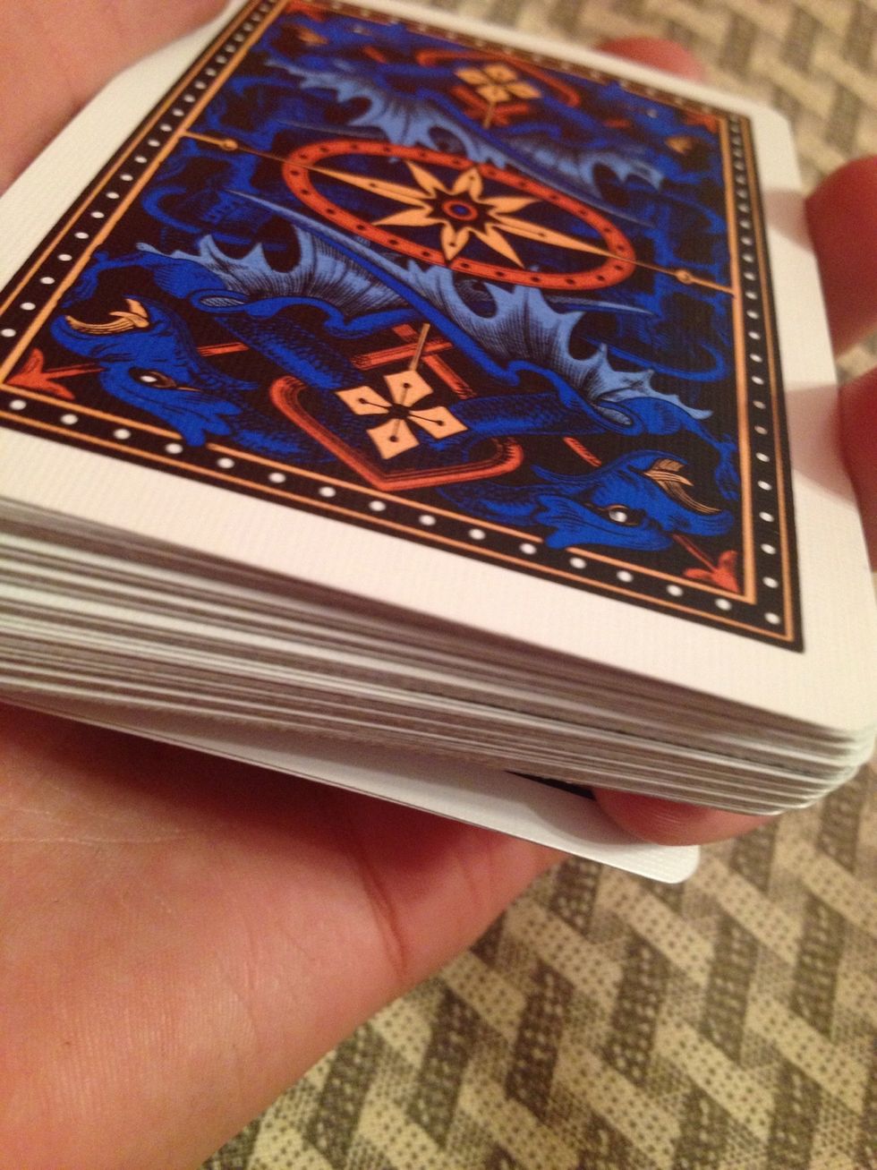 Get a pinky break on top of the bottom two cards.