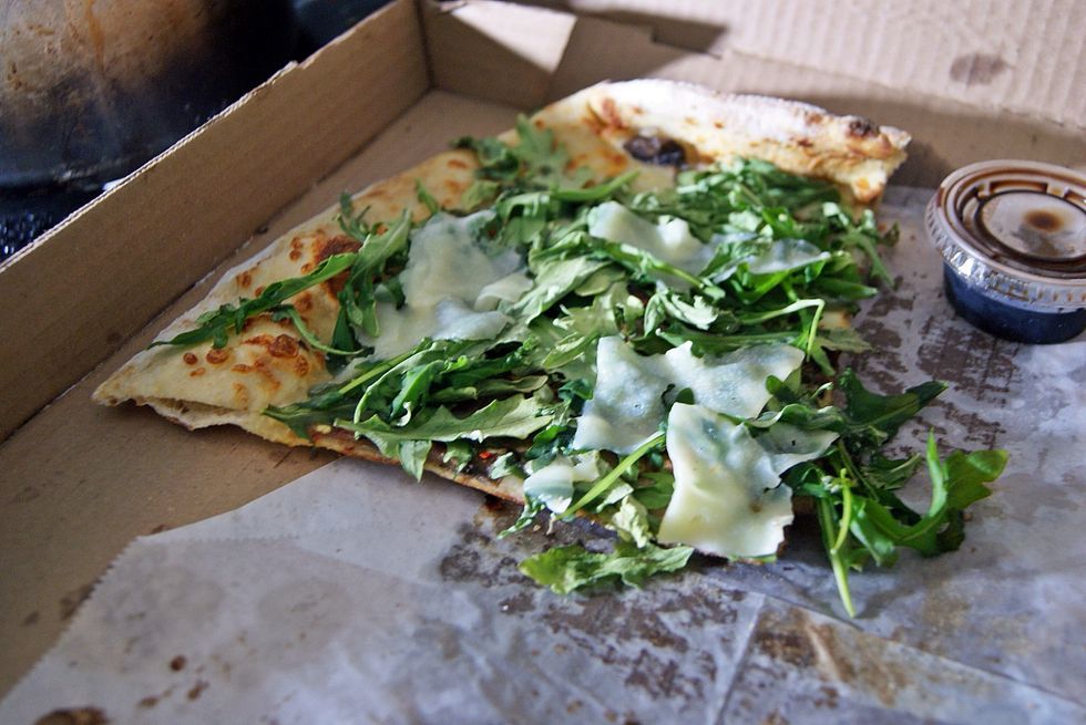 Get a pizza with no tomato based sauce and a lot of green stuff on it. This one had arugula. Enjoy pizza and leave back at least 2 slices.