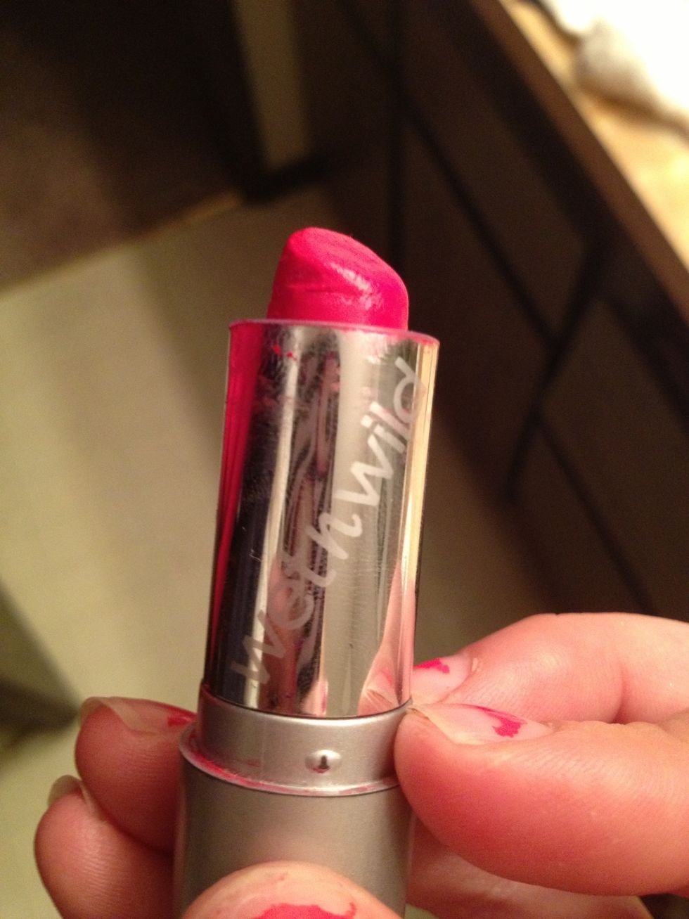 Get a red color and outline the lips