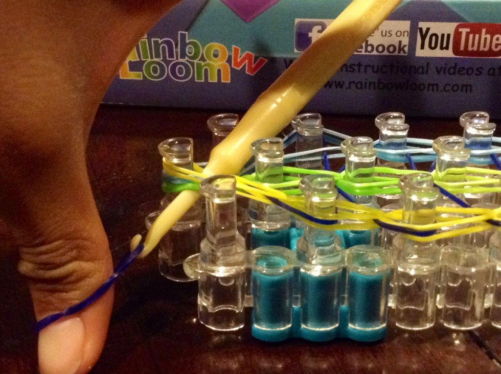 Get a rubber band and put it on the hook