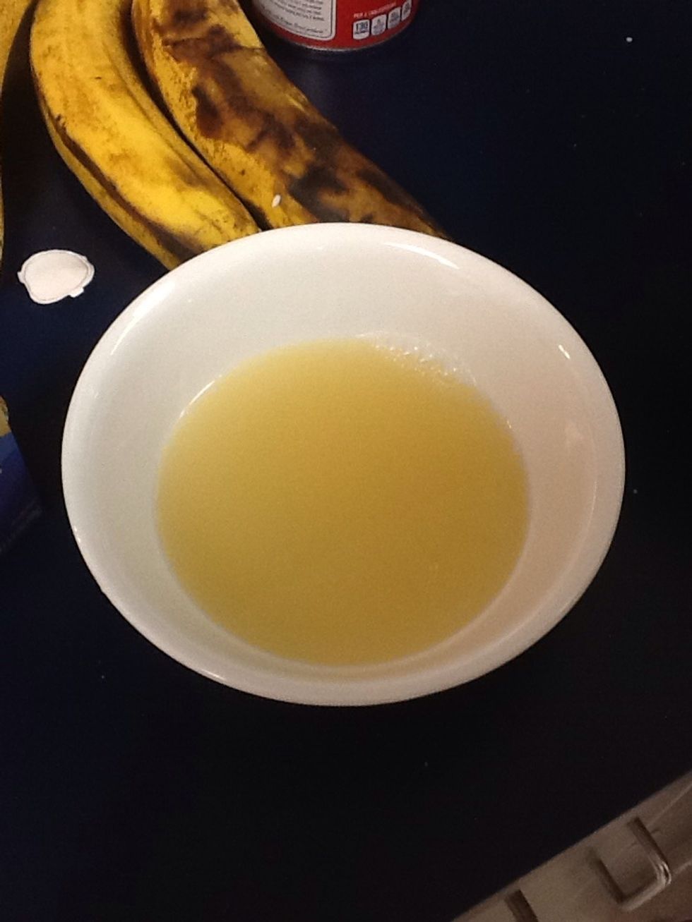 Get a small bowl and fill with 1/2 cup of lemon juice.