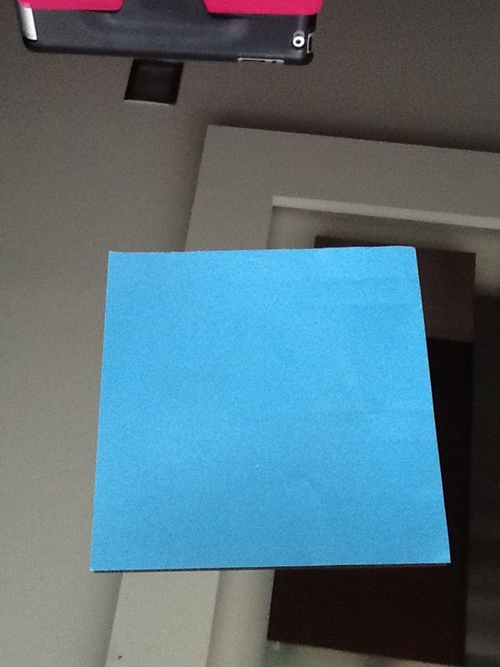 Get a square shaped paper, or origami paper