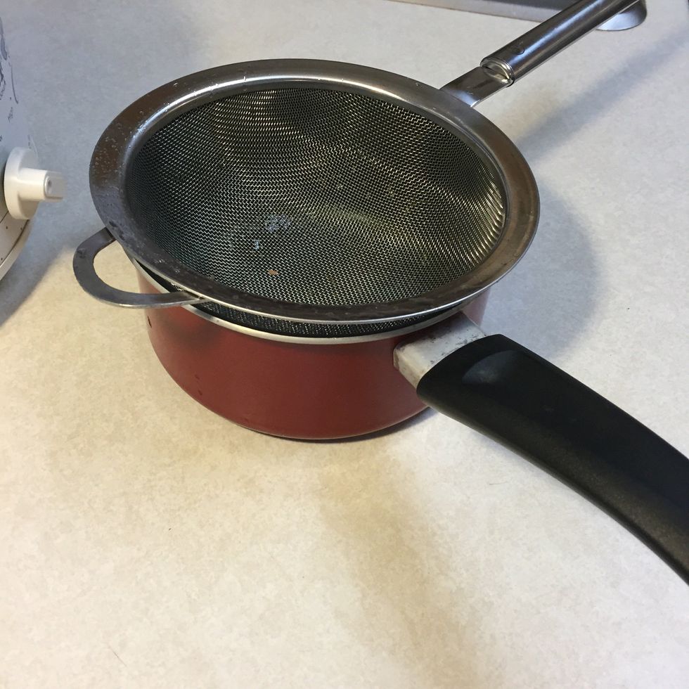 Get a strainer because you'll want to catch the excess