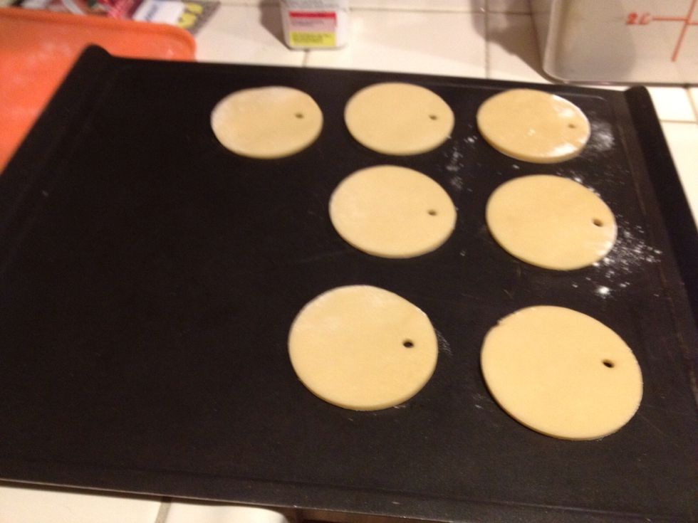 Get a straw and make little circles at the top with the end of your straw