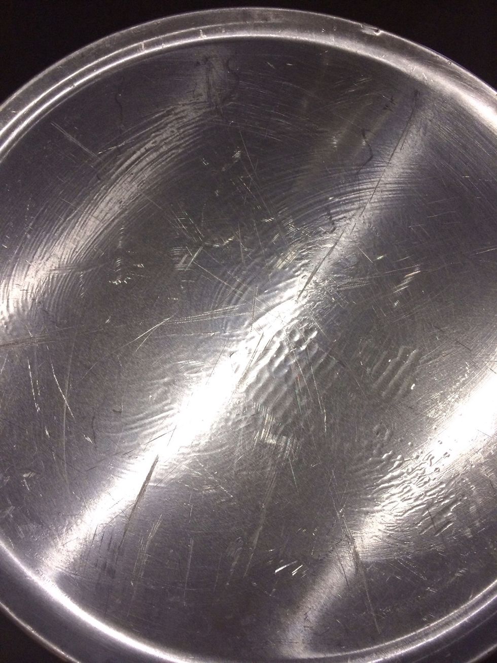 Get a tray (make sure it is large enough for your desired size of pizza. I had a circular tray but you can use a rectangular tray)