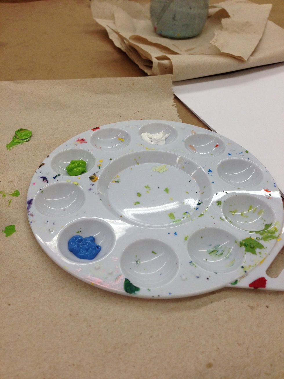 Get acrylic paint! We used Martha Stewart's craft paint, higher quality I think.