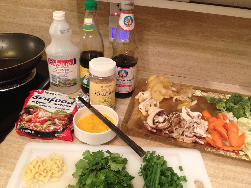 Get all of your ingredients prepped and at your reach. Chop your veggies to bite size. (I ended up not using the vinegar and I did use some mushroom seasoning but it's not pictured)