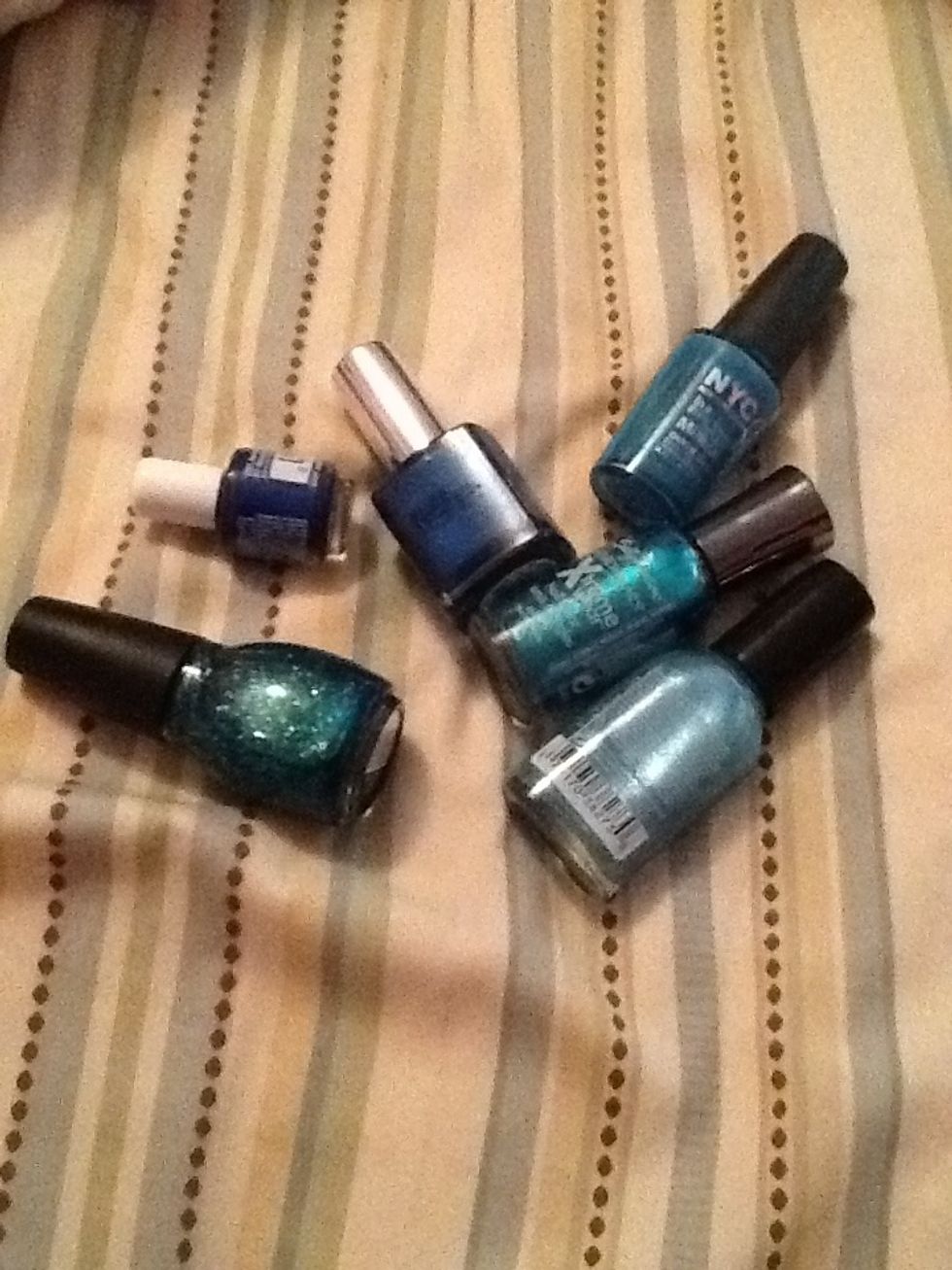 Get all your shades of nail polish. Here I'm doing blue. You could even switch between colors of you had the right shades!