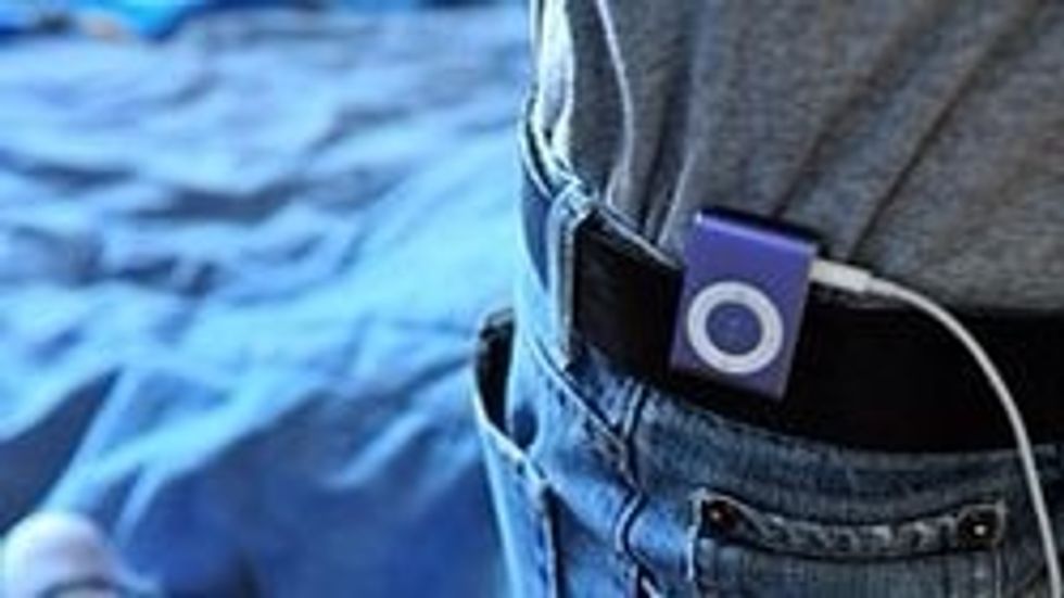 Get an mp3 player,or a stereo and play music while you clean (as long as it won't bother others). It can help distract you from the task at hand, and it can make it more fun!
