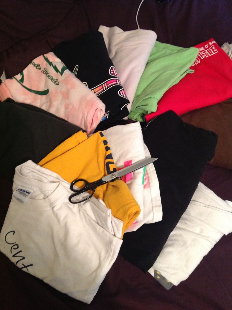 Get an Old, over sized t-shirt and a pair of larger scissors (regular ones work too but its easier with big ones)