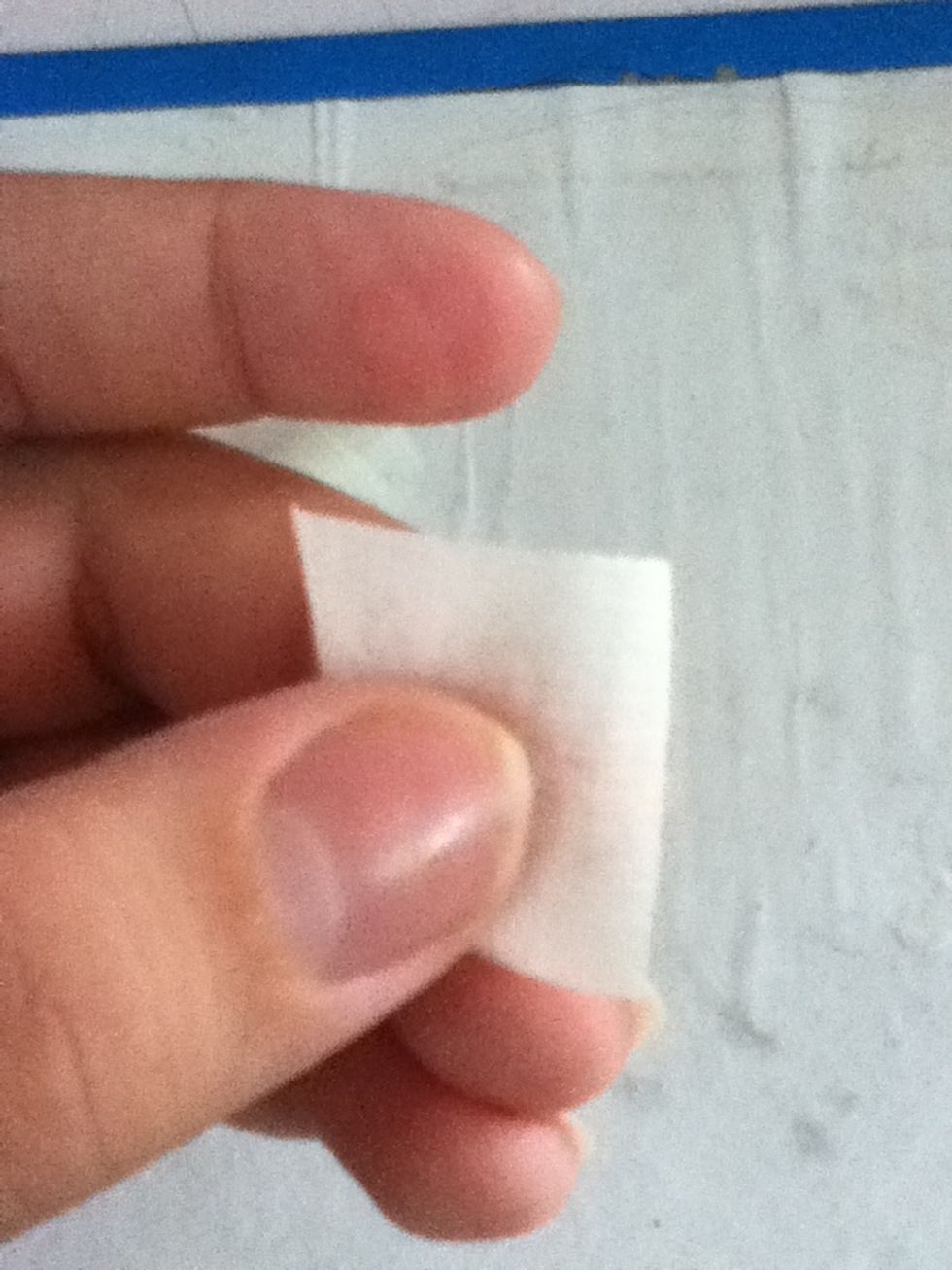 Get another pease of tap and put your thumb on it