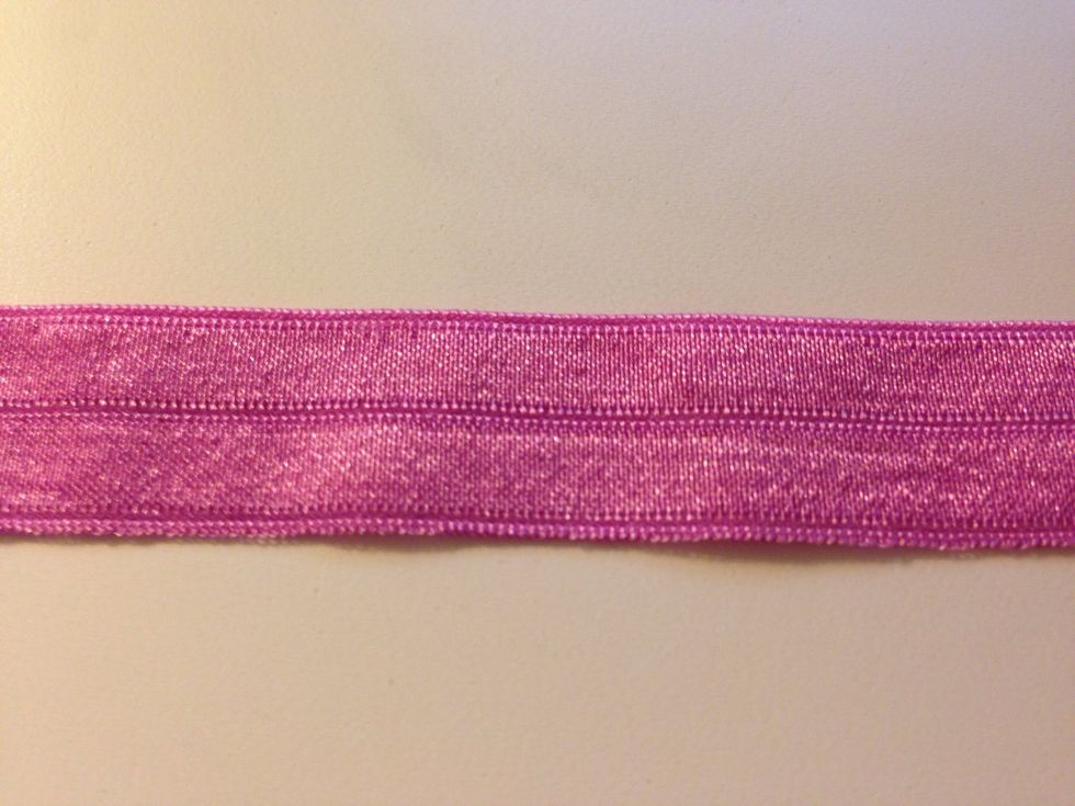 Get as many yards and colors of fold over elastic as you want. 1 yard = 4 hair ties. You can buy online (sunshineshoppesupply) or at a fabrics store. It should look like the pic above.