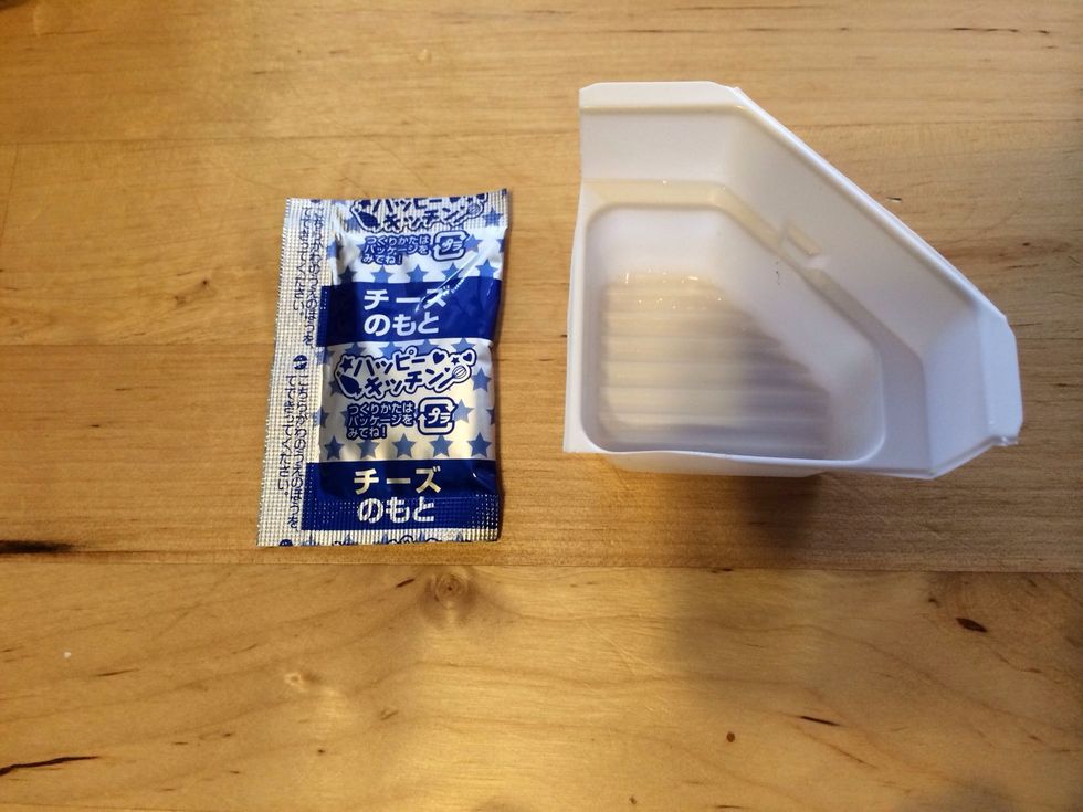 Get BLUE Packet Cheese Mix, a mixing tray, and Water