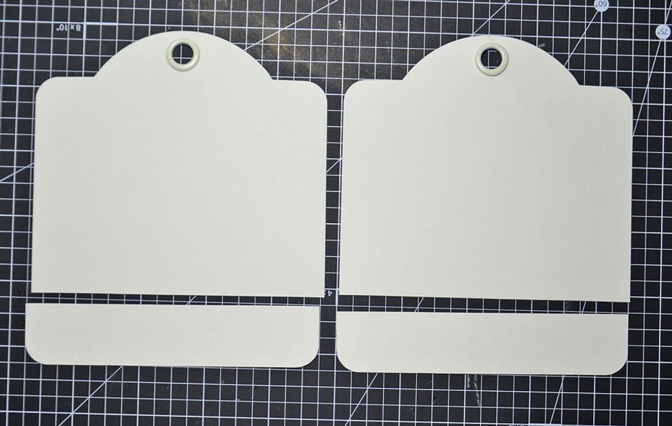 Get both large square tags and trim 2.5cm off of the bottom of both and set aside.