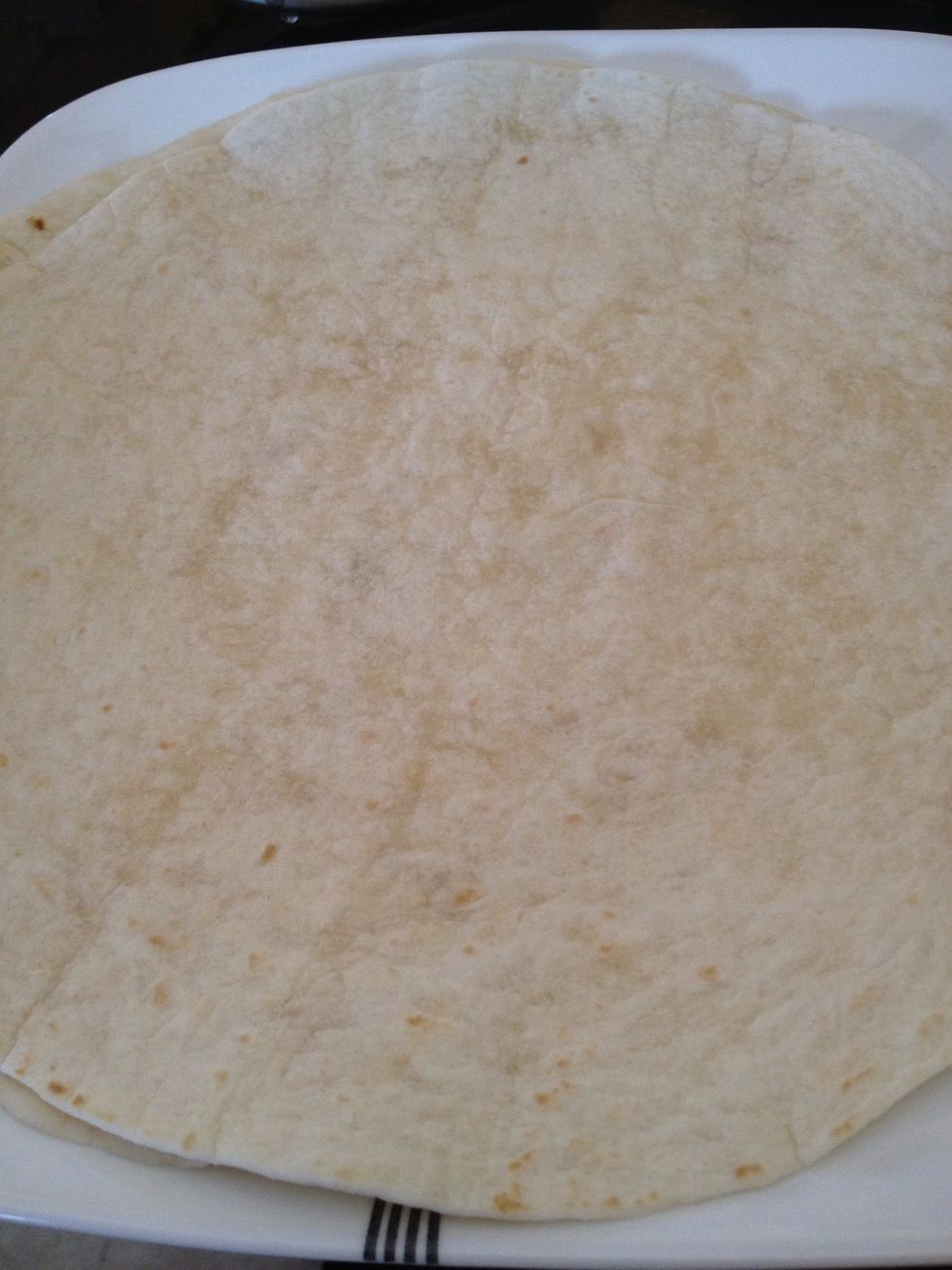 Get flour tortilla I use the big ones but you can make small ones also which are good for party's etc