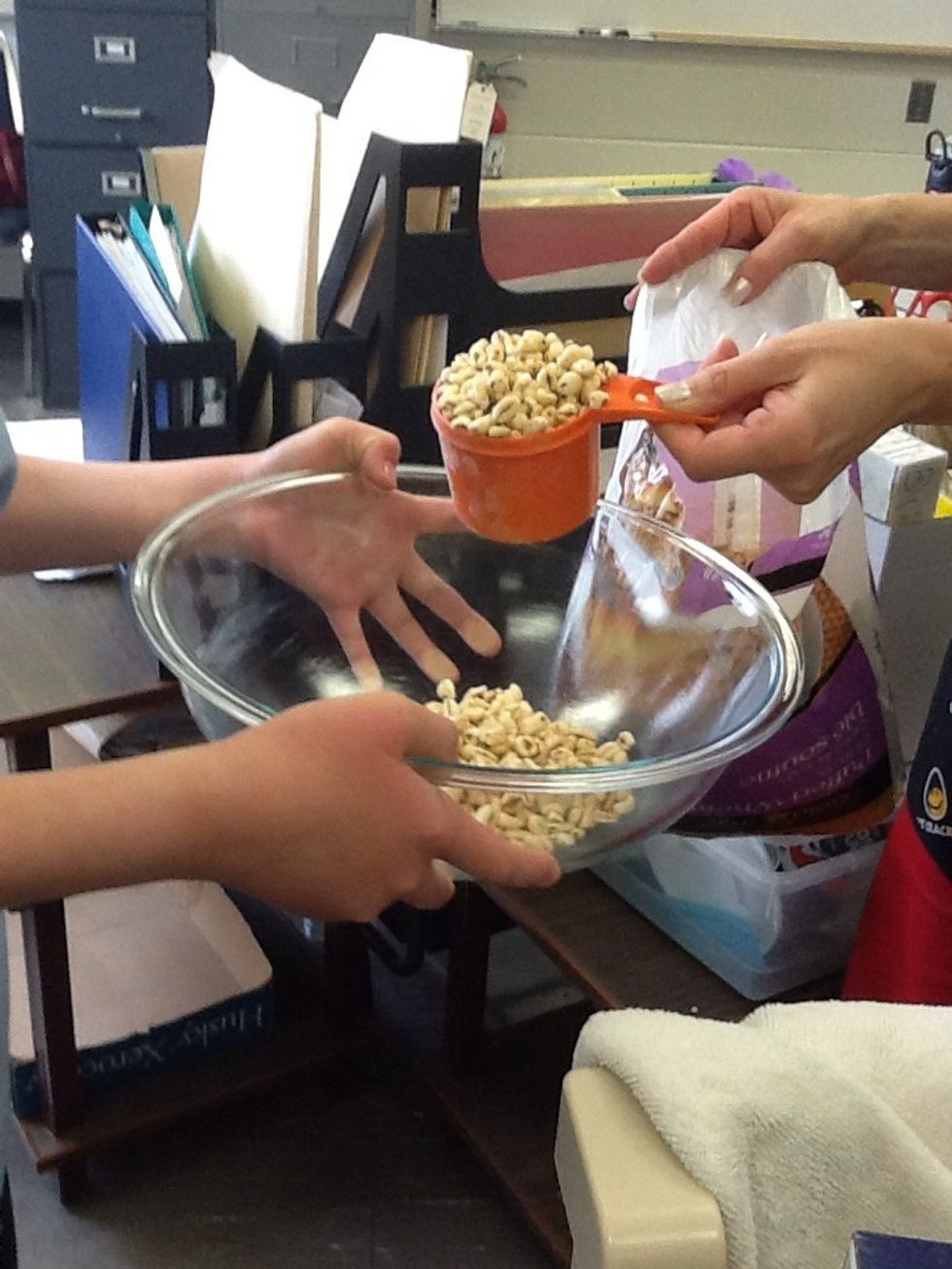 Get four cups of puffed wheat