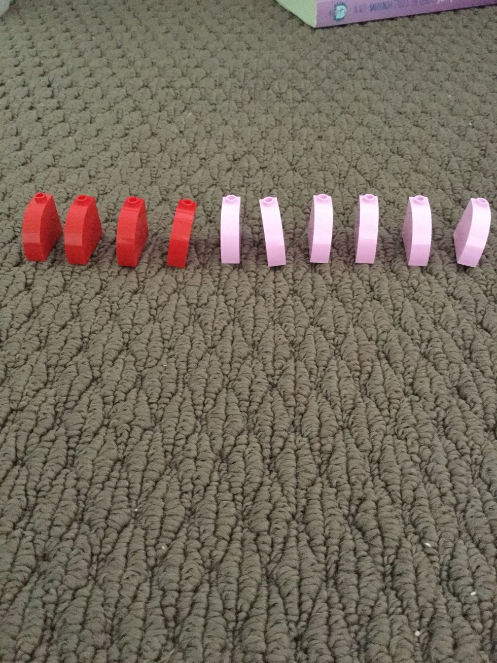 Get four red and six pink of the quarter-of-a-circle like pieces.