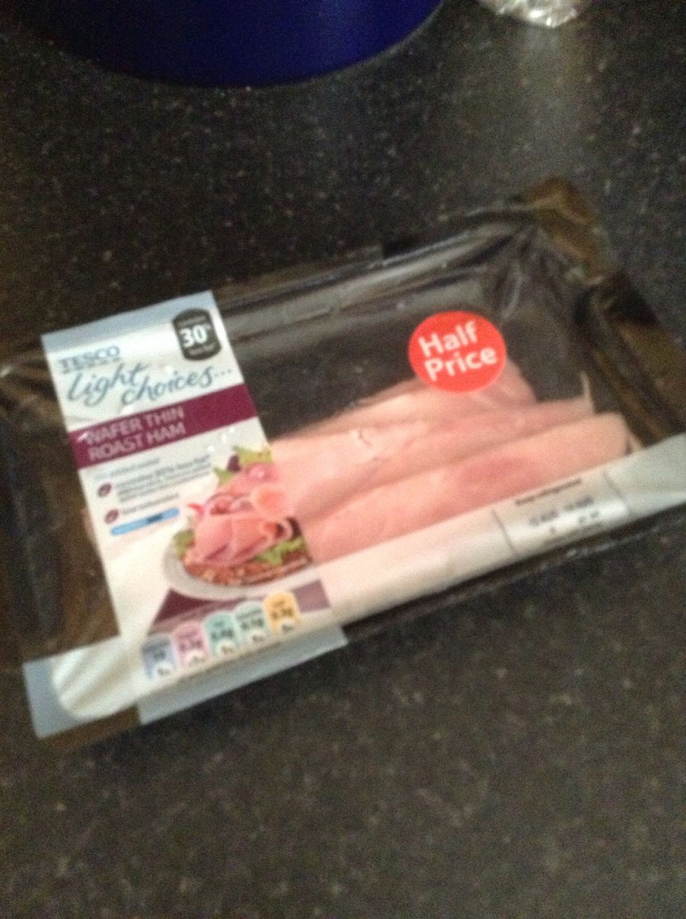 Get ham (sandwich filling) cut it open using a knife