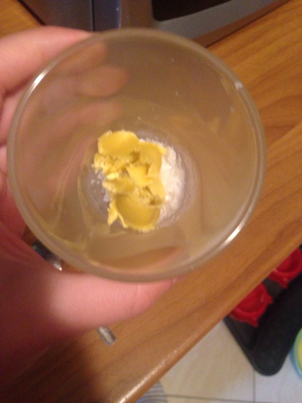 Get in a small microwave safe cup the oils/ butters which are hard and need melting. So i have here coconut oil and unrefined Shea butter