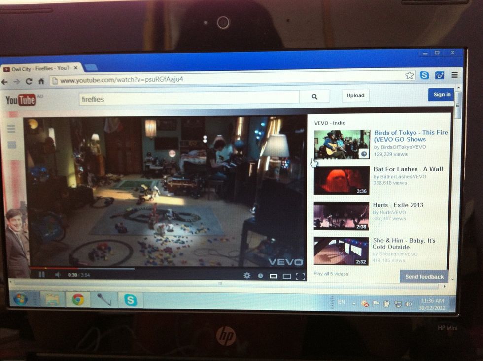 Get on to YouTube and search up a song that you want to download and click on it