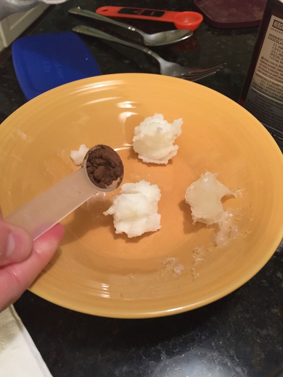 Get one half of a teaspoon of cocoa powder into the bowl