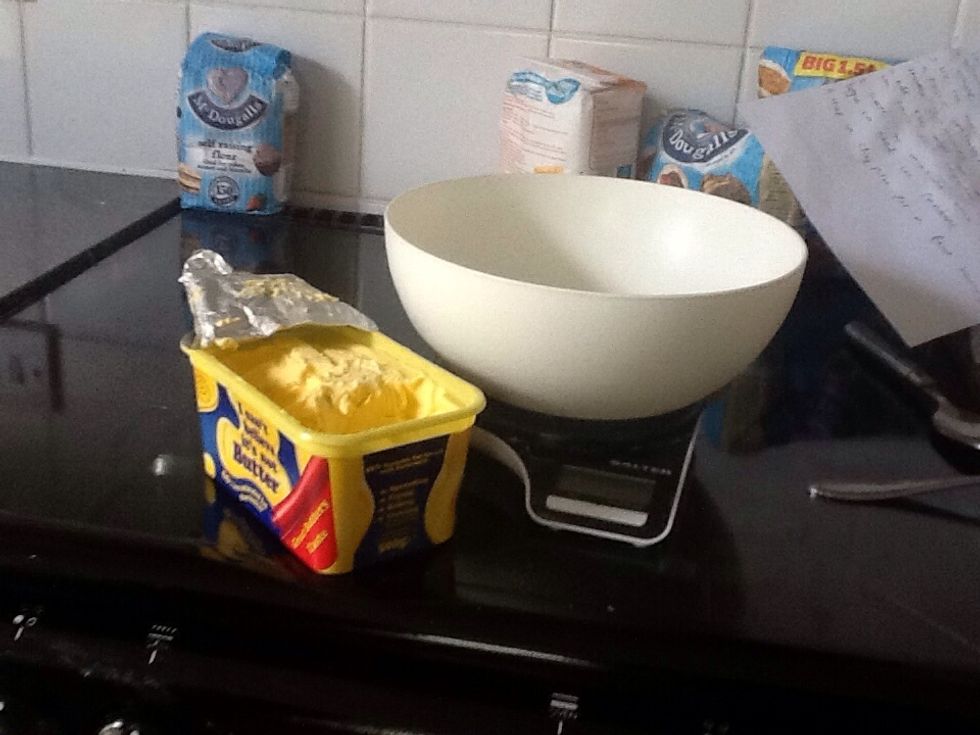 Get out a large mixing bowl and add 240 grams of butter