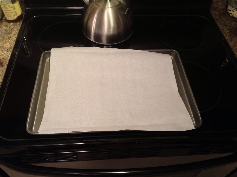 Get out a sheet pan and line with parchment paper.