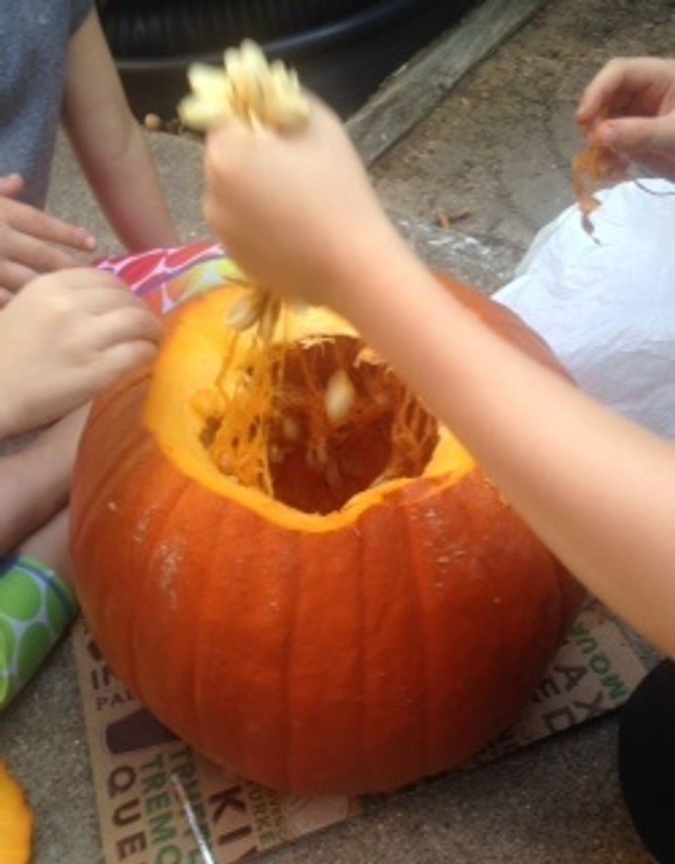 Get out all the pumpkin seeds and guts.