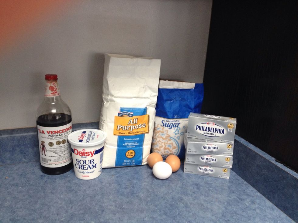 Get out all your batter ingredients. We want the eggs, sour cream, and cream cheese to reach room temperature.