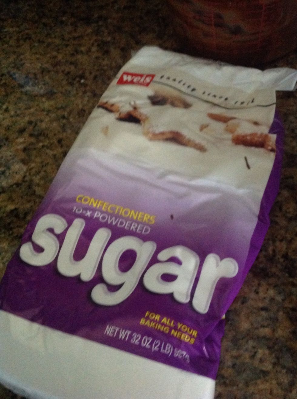 Get out confection sugar and add 1 and a 1/2 cups of confection sugar.