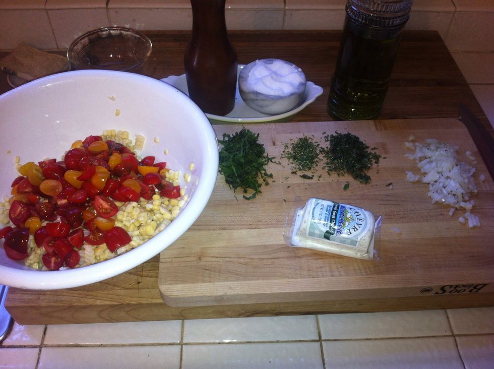 get out that delicious goat cheese, set it aside and put the rest of your ingredients into the large bowl with the corn (you know the tomatoes, oil, s&p, herbs, and onion)