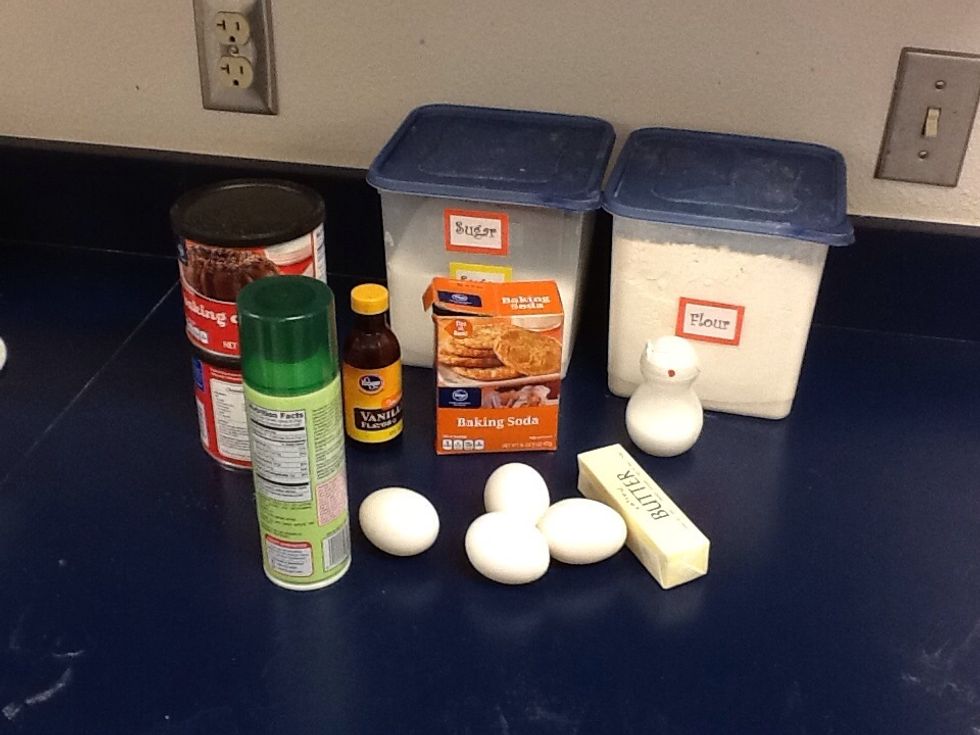 Get out the ingredients. White sugar along with confectioners sugar, butter, cocoa powder, vanilla extract, all purpose flour, baking powder, salt.