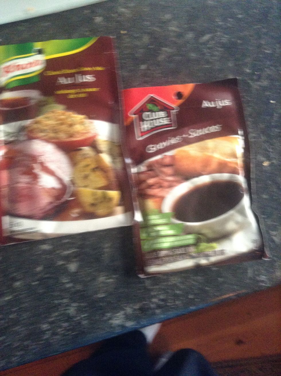 Get out your 2 packets of Au Jus gravy and empty into a pot with some water and stir.