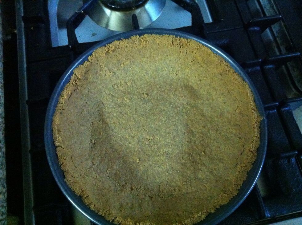 Get out your crust, which should have browned a bit on the edges