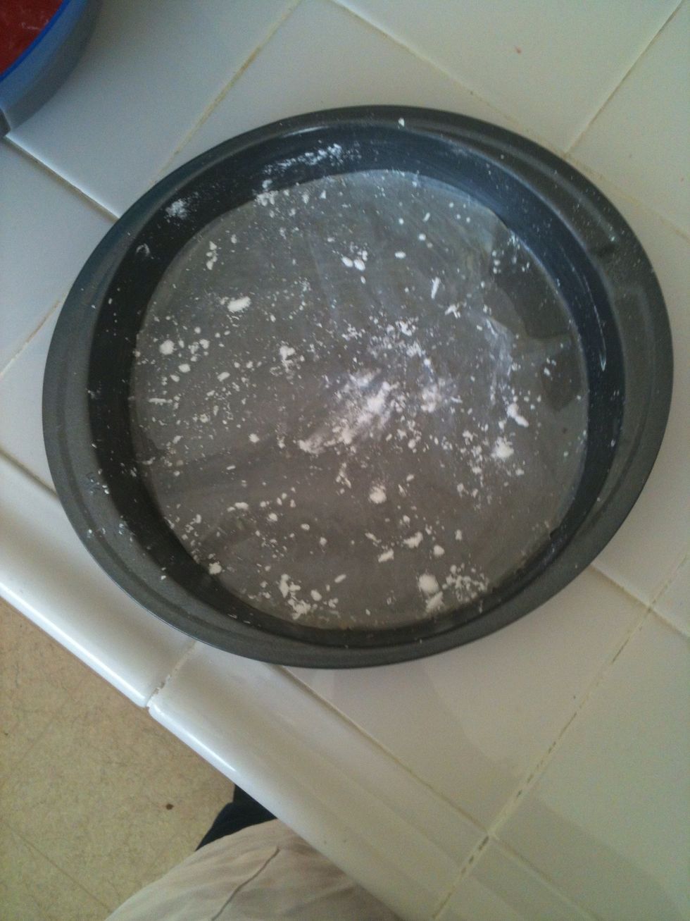 Get out your pan! This has wax paper lining at the bottom, has been brushed with melted butter and sprinkled with cornstarch! *This makes it much easier to take out of the pan when done baking.*