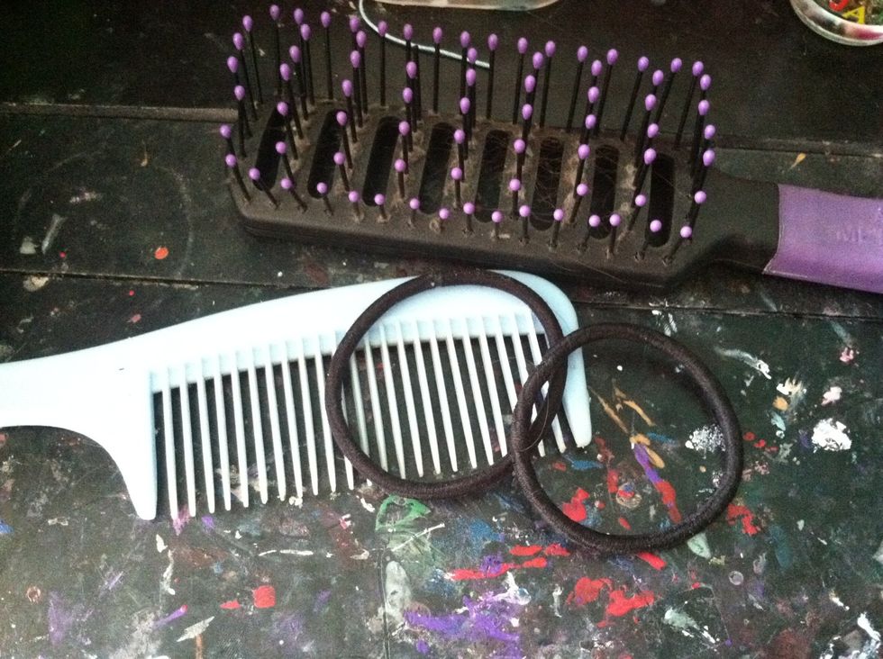 Get out your supplies. This goes for most braiding: do this with damp hair(not soaking). It will make it easier b/c the hair is frizzing, it's relaxed when it's wet (so to speak).