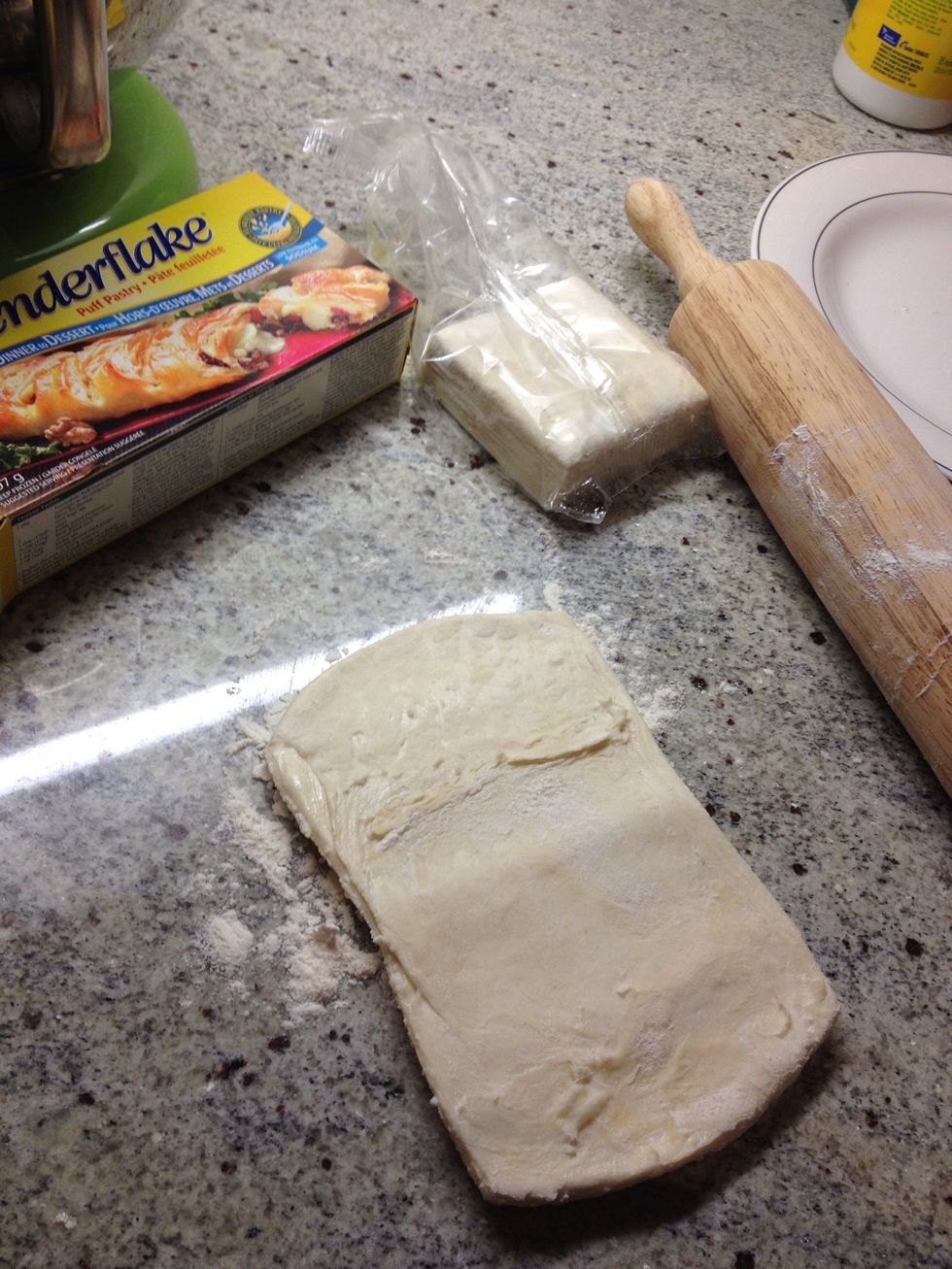 Get out your thawed puff pastry and roll it out into a long piece - one square at a time. (I only made 2 apples so I used half a package - just one square)
