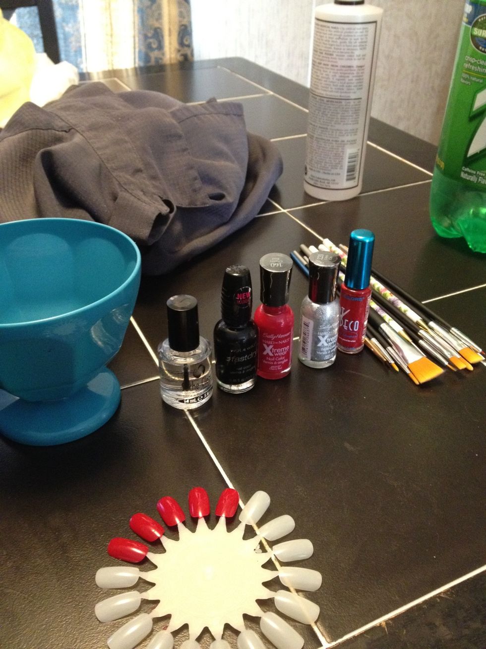 Get set up. I set out a bowl of remover, my polishes, and brushes :)