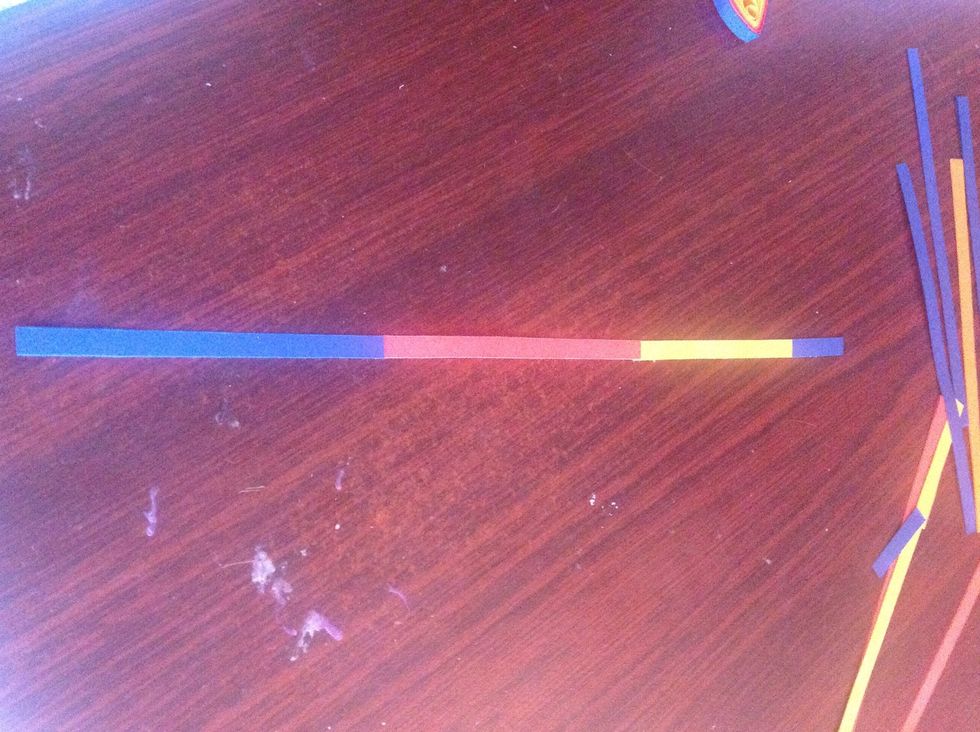 Get some another all colour add strips ....but not same size .... Blue 15cm , red 10cm , yellow 5cm , again blue 3cm