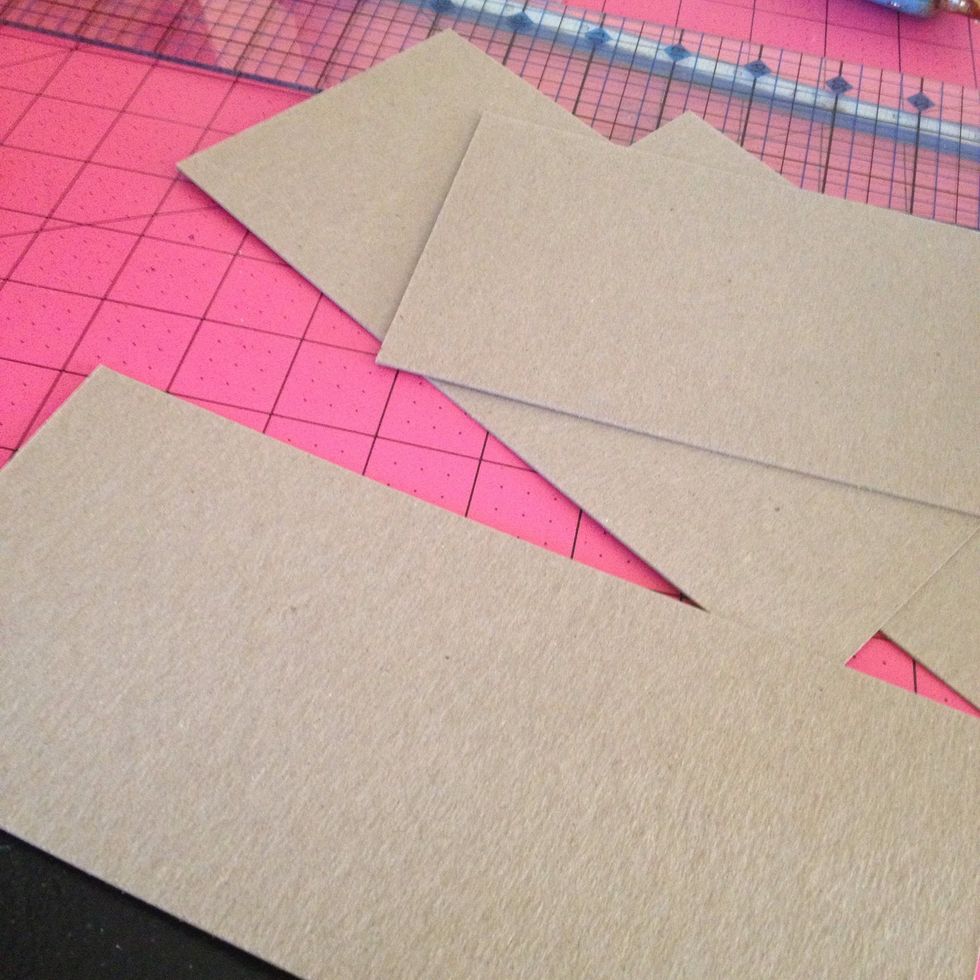 Get some chipboard to support the mask- an old cereal box is a great way to repurpose and recycle if you don't have chipboard handy. Cut it a little bigger than your mask, set aside for now