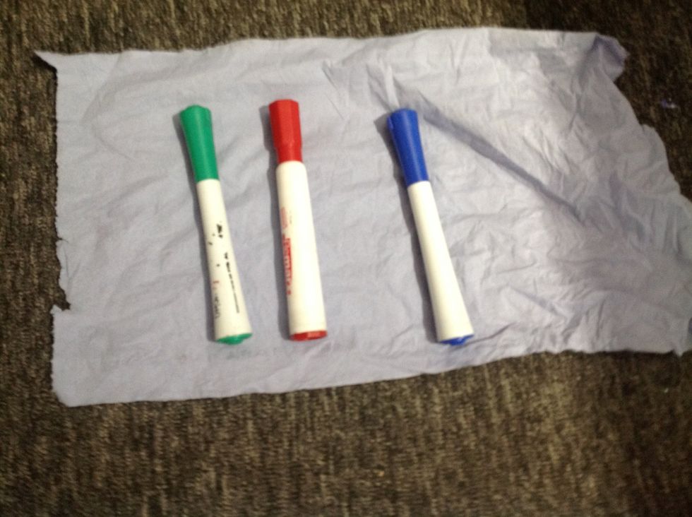 Get some coloured pens (I am using whiteboard pens and a whiteboard) and some cloth